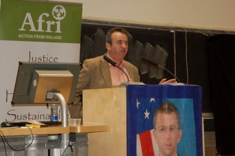 Click on image to see full-sized version Gerry Conlon addresses the meeting at Trinity