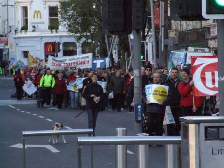 Still more people on the march, Grand Parade.